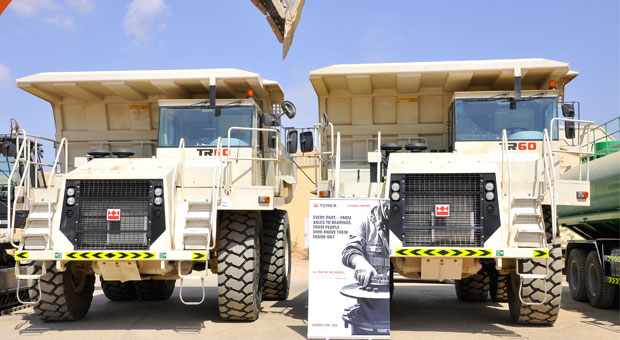 Two Terex Trucks TR60 rigid dump trucks provide versatility at Oman Cement Company quarry in Muscat