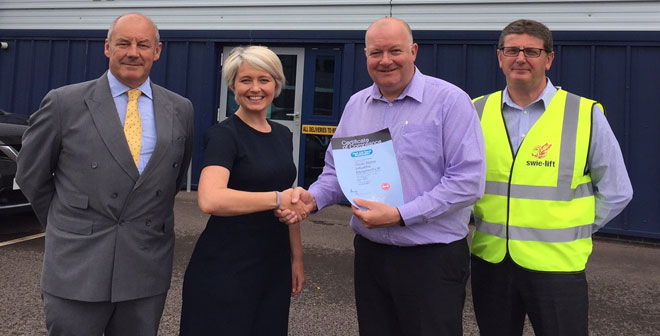 FLTA presents first on-site compliance certificate to SWIE-Lift