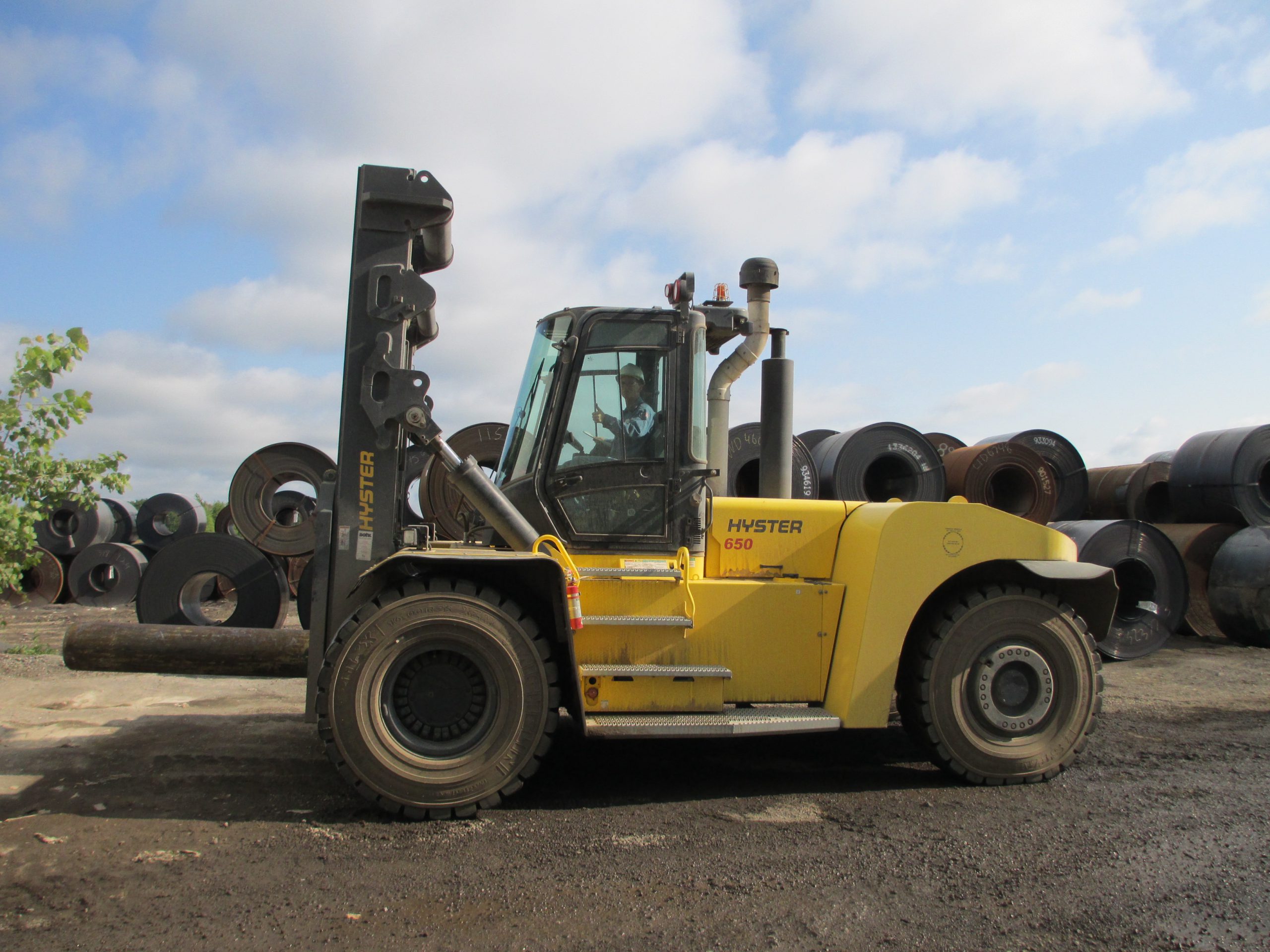 450 degree C COILS GET LIFTED BY 30 TONNE TRUCK WITH CHAINLESS MAST
