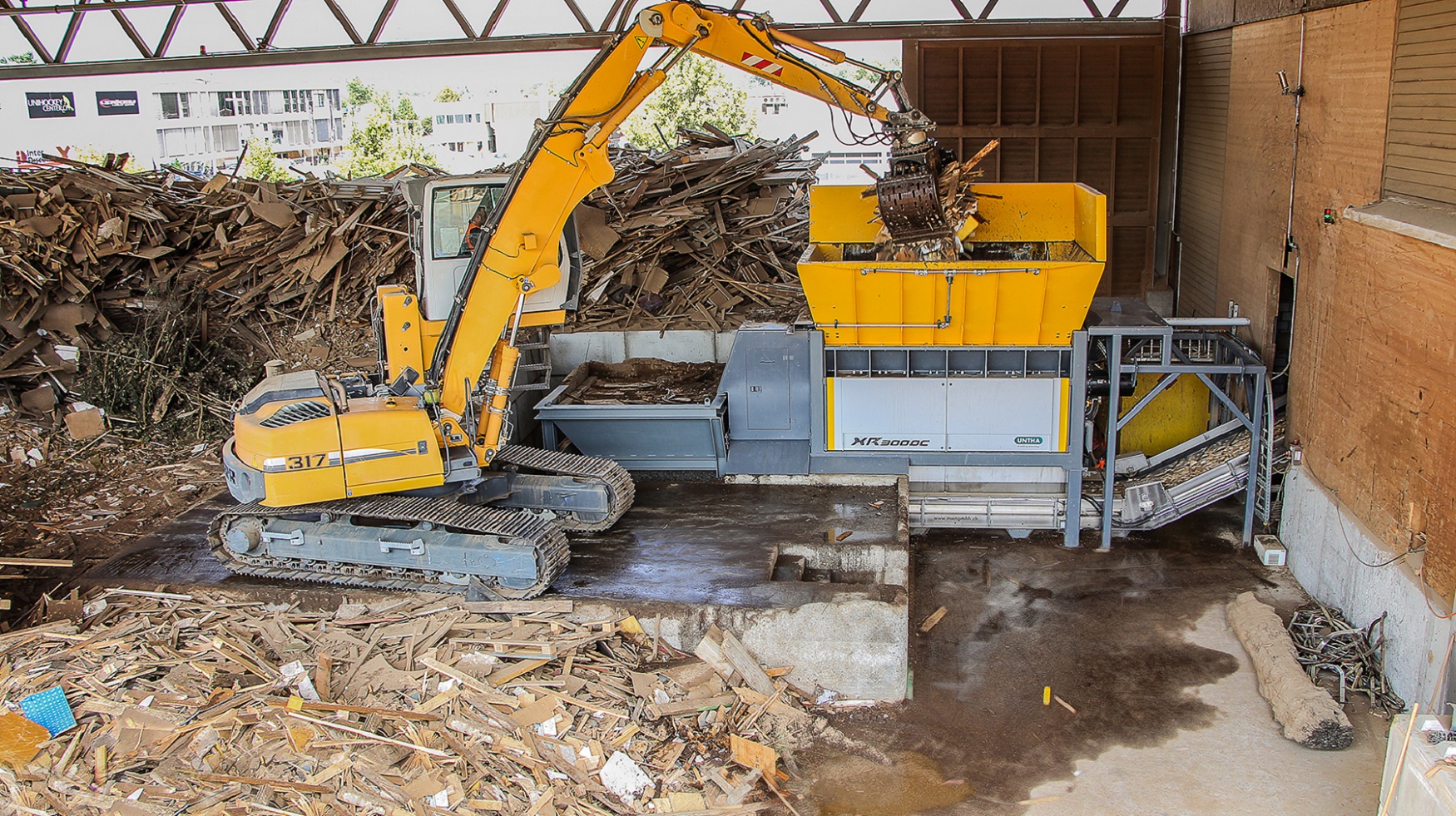 Swiss waste expert overhauls biomass with UNTHA shredder