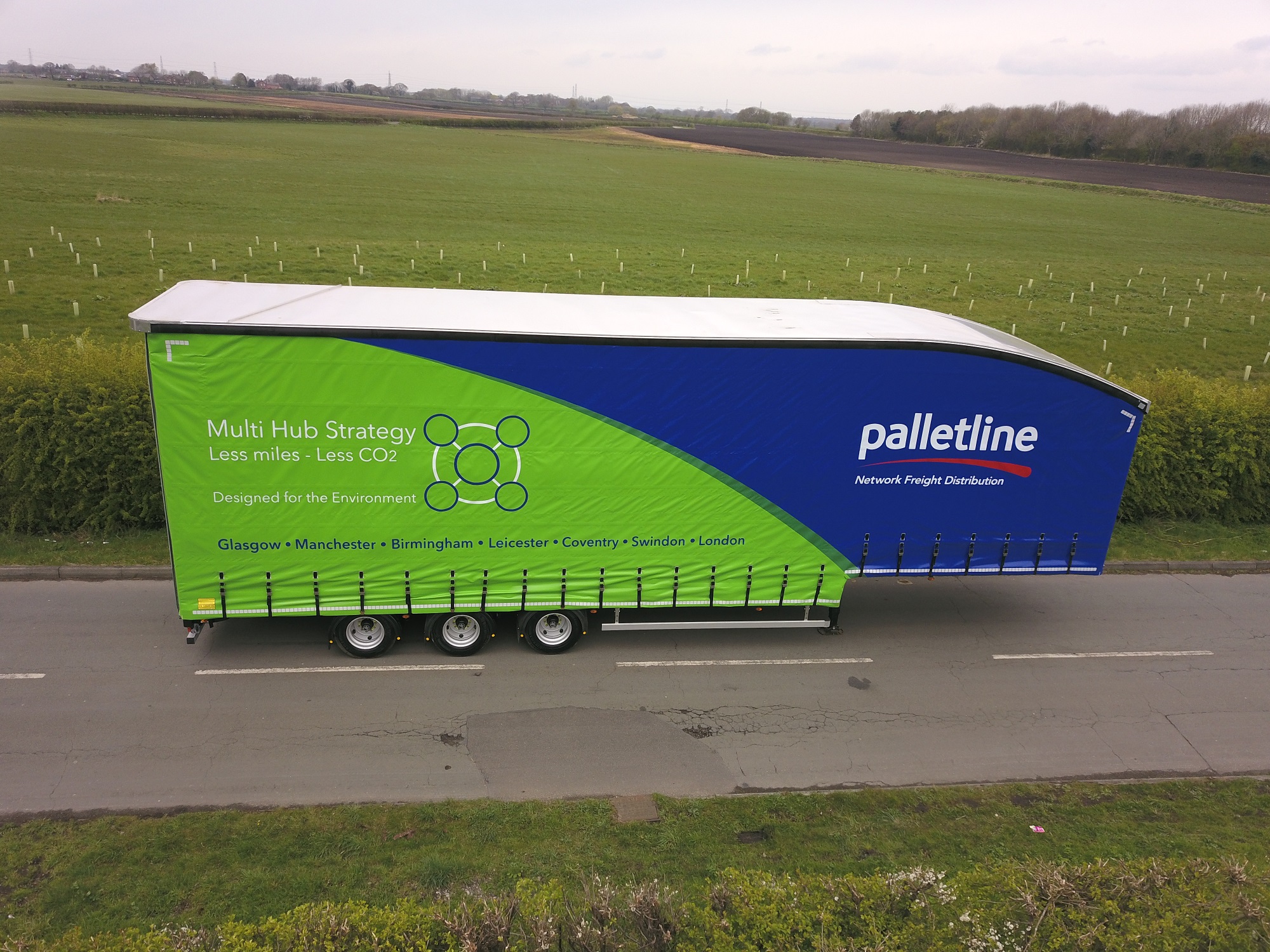 CARTWRIGHT GROUP CUSTOMER ALAN R JONES ORDERS CURTAINSIDER WITH SPECIAL LIVERY PROMOTING PALLETLINE ENVIRONMENTAL MESSAGE