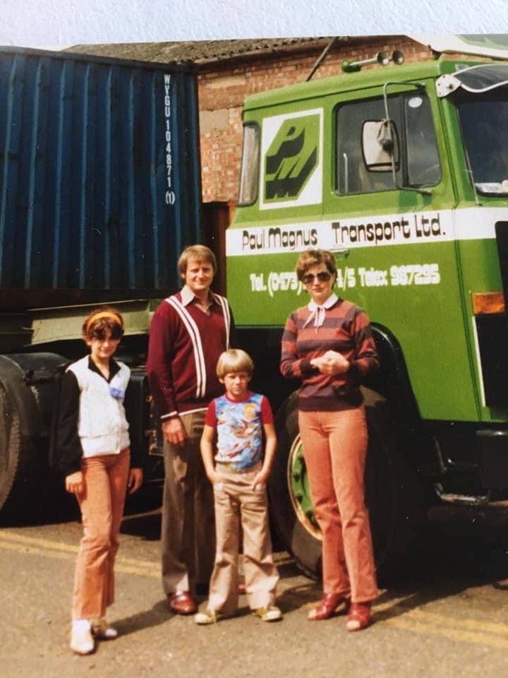 Emma and Olly with parents as children