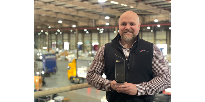 Ken from Palletline displays his SHE Health and Safety Manager of the Year Award